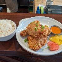 Fried Chicken · Four piece leg & thigh, served with rice, house pickles, spicy chicken sauce