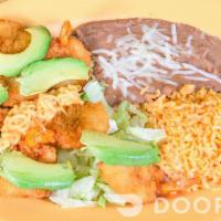 Camarones Empanizados · Deep-fried shrimp topped with avocado, served with chipotle aioli, rice, refried beans, and ...