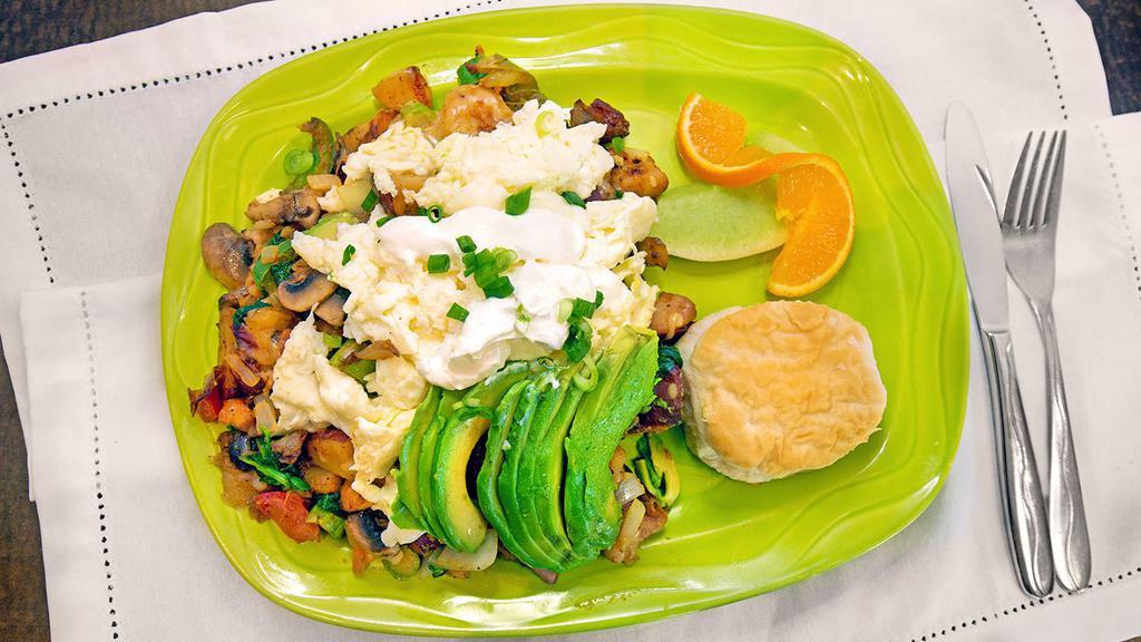 Veggie Hash · Hash house potatoes, mushrooms, spinach, asparagus, tomato, bell peppers, avocado, onion, jack cheese. Topped with scrambled egg whites, sour cream and chives.