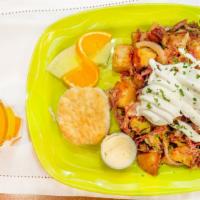 Irish Hash · Hash House Potatoes, Corned Beef, Red Onion, Jack Cheese, Parsley, and topped with creamy Ho...
