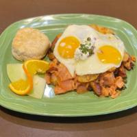 Monterey Hash · Hash house potatoes, smoked salmon, scallions, topped with cream cheese, dill, capers, red o...