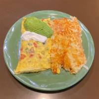 Cali Omelette · Avocado, mushrooms, green onions, tomatoes, sour cream, jack, cheddar & swiss cheese.