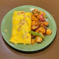 The Supreme Omelette · Sausage, bacon, ham, Jack, Swiss and Cheddar cheese.