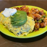 Tex-mex Omelette · Jalapenos, avocado, ortega chilies, black beans, sour cream, queso fresco and topped with sa...