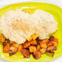 Southern Scramble · Two biscuits topped with country sausage, scrambled eggs and our creamy country gravy. (No T...