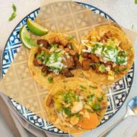 Taco Trio  · Your choice of three tacos.