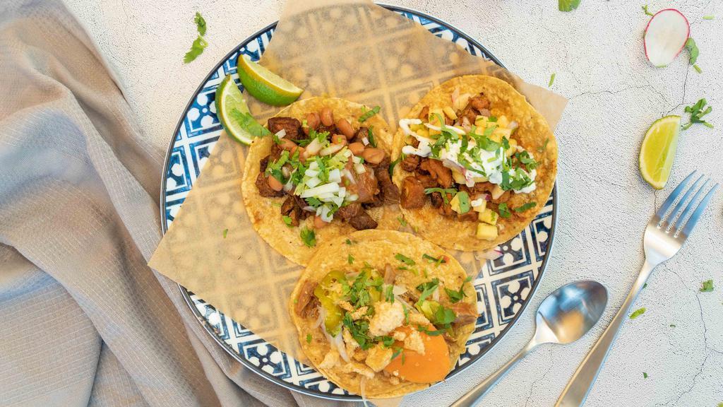 Taco Trio  · Your choice of three tacos.