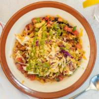 Bowl · Spanish rice, stewed black beans, avocado salsa, pico de gallo, cabbage salad, fried onions ...