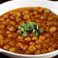 Chana Masala · Garbanzo beans cooked in spicy sauce.