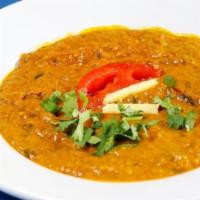 Baingan Bhartha · Mashed eggplant cooked with tomatoes, onions and special blend of spices.