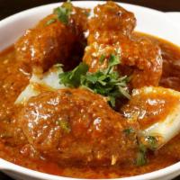 Aloo Vindaloo · Potatoes and green peas in a special spicy sauce.
