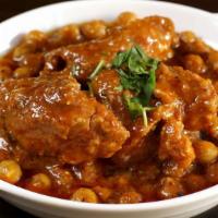 Cholay Chicken · Garbanzo beans cooked with chicken.