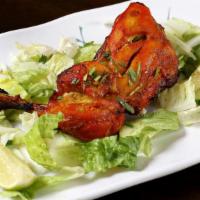Chicken Breast Tandoori · Two pieces. Marinated chicken cooked in a clay oven.