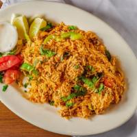Lamb Biryani · Stir-fried rice with lamb and a special blend of biryani spices.