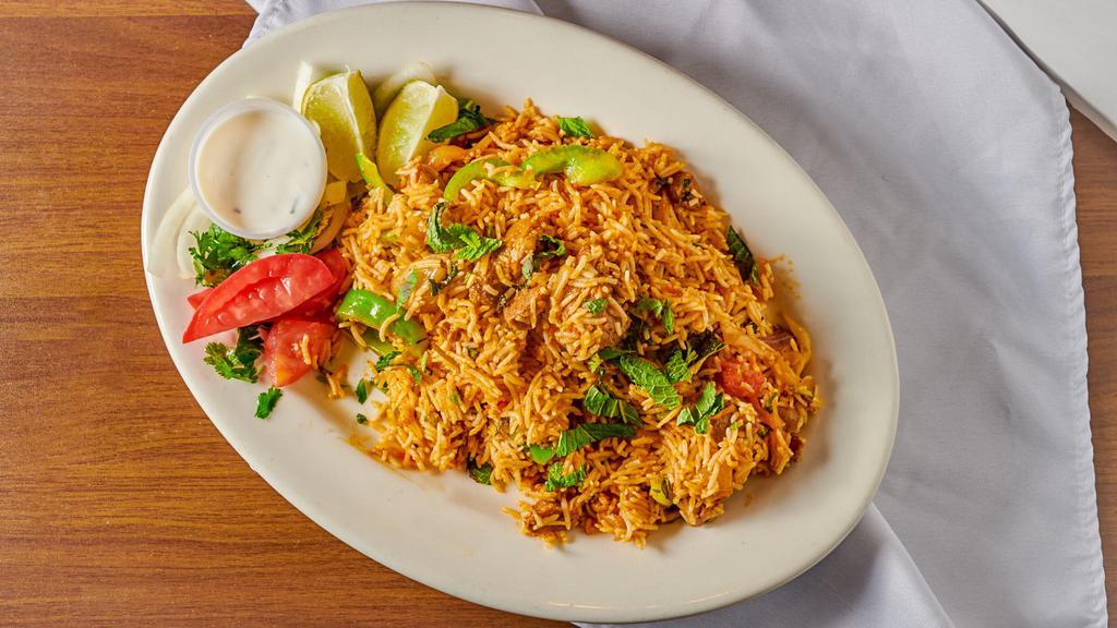 Lamb Biryani · Stir-fried rice with lamb and a special blend of biryani spices.
