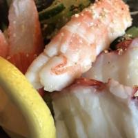Sunomono · Japanese cucumber salad with octopus, shrimp, and imitation crab meat.