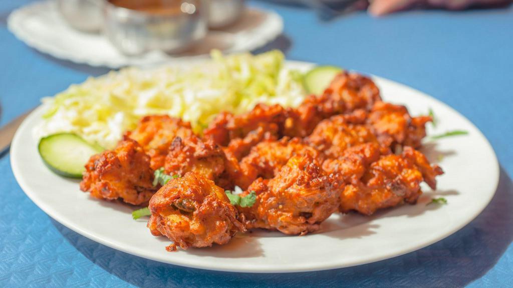Fish Pakora · Deep-fried white fish that has been marinated in traditional spices.