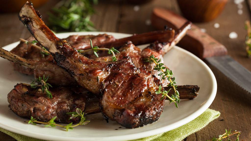 Lamb Chops · Tandoor clay oven lamb chops marinated with aromatic herbs and exotic spices.