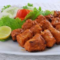 Chicken Malai Boti · Boneless chicken breast marinated in a blend of yogurt and spices, and gently barbequed on a...
