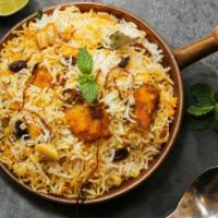 Chicken Biryani · Saffron basmati rice, marinated chicken, and mixed vegetables cooked with exotic spices and ...
