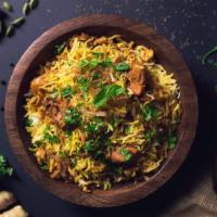 Goat Biryani · Saffron basmati rice, tender marinated goat and mixed vegetables cooked with exotic spices a...