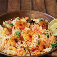 Shrimp Biryani · Saffron basmati rice, fresh marinated shrimp, and mixed vegetables cooked with exotic spices...