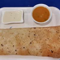 Onion Rava Masala Dosa · Thin crispy wheat and rice crepe stuffed with mildly spiced mashed potatoes and onions.