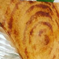 Cheese Masala Dosa · Thin long rice and lentil crepe filled with grated cheddar cheese, potatoes and onions.