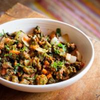 Bhindi Tarkari · Vegan. Fresh okra sauteed with onion, chopped tomatoes, ginger garlic paste, and homemade sp...