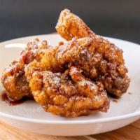 7 Piece Soy Garlic · Korean Style Fried chicken tossed in the pan with our homemade Soy Garlic sauce. Sprinkled r...