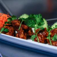 Spicy Chicken Wing 2 U · Medium spicy only! Crispy chicken wing with garlic, ginger, cilantro, cucumber and homemade ...