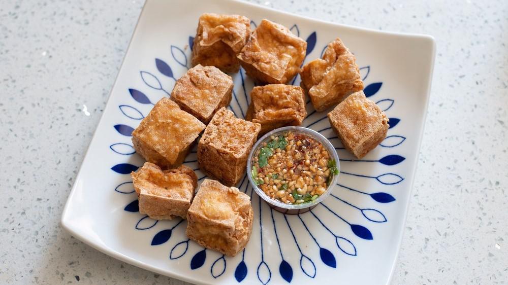 Fried Tofu · Vegetarian. Deep-fried tofu served with chopped peanuts, cilantro and dried chili in sweet and sour sauce.