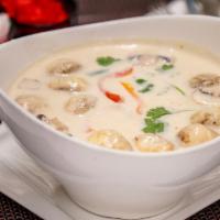 Coconut Soup (Tom Kha) ￼ · Coconut milk soup with lemongrass, galangal, kaffir lime leaves, mushrooms and cilantro (for...