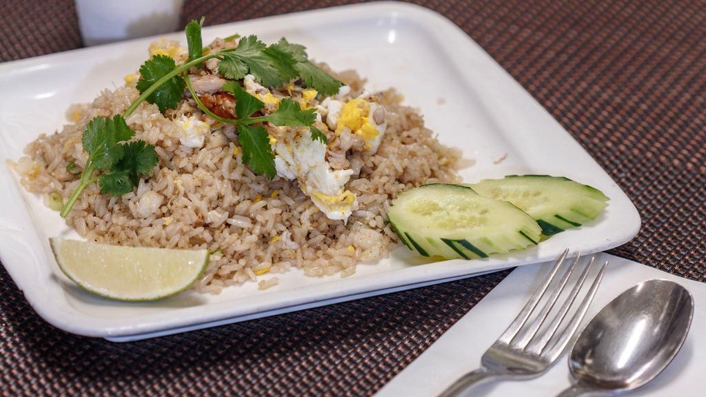 Crab Meat Fried Rice · Thai style fried rice with crab meat, eggs, scallions, and cilantro.