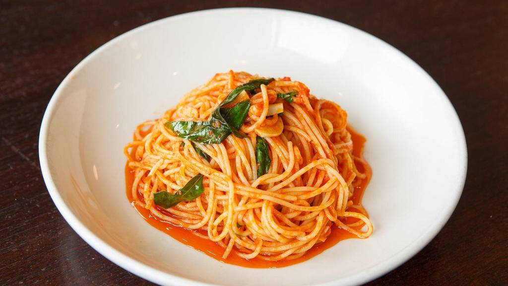 Spaghettini · tomato conserva, garlic, basil. ADD roasted chicken, fennel sausage or meatballs  $5.00