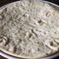 Gluten-Free Shell · unbaked gluten-free crust for you to make a pizza at home