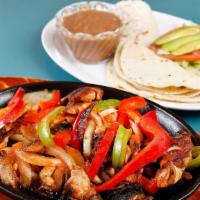 #22 Fajitas · Grill chicken or grill steak, with red and green bell pepper onion and tomato.