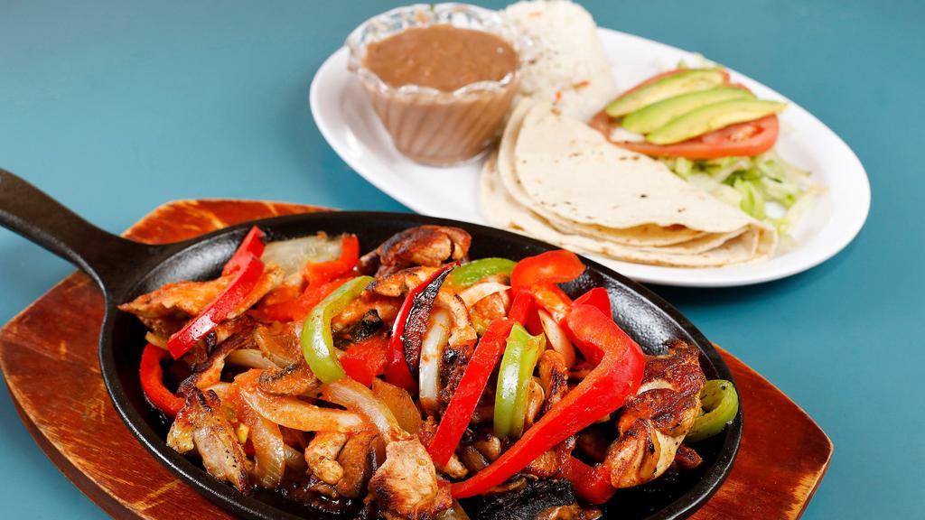 #22 Fajitas · Grill chicken or grill steak, with red and green bell pepper onion and tomato.