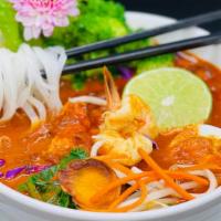House Special Noodle Soup 32oz · creamy curry coconut soup, rice noodle, sprouts, onions, hard boiled egg, cilantro &  steame...