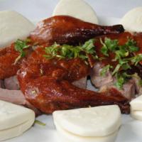Half Roast Duck · Includes six buns, scallions, hoisin sauce