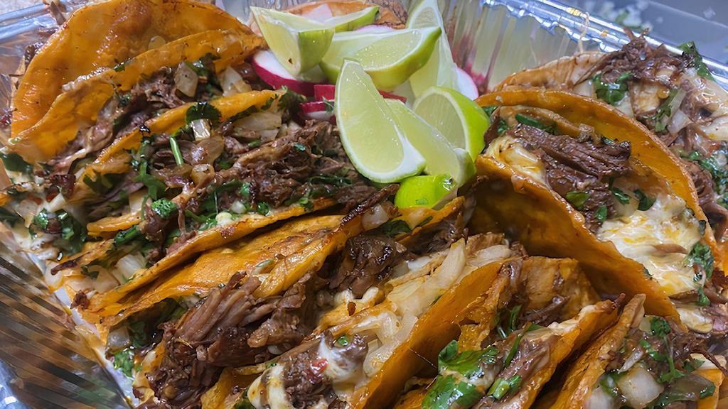 Birria Tacos Family · 12 birria tacos whit chessee and 4 consomes.