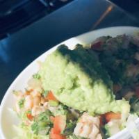 Ceviche · Shrimp, fresh lime juice, avocado slice, tomatoes, onions, cucumber, jalapeños, cilantro, to...