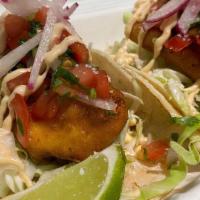 Canastaco Fish Tacos (2) · #1 food truck item. Two big, crunchy corn tortilla, wrapped in a soft corn tortilla and fill...