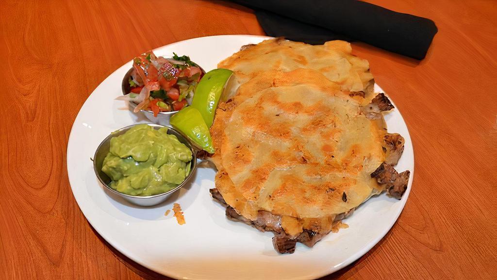 Chiquitas Corn or Flour · Small quesadillas, choice of meat.
