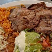 Asada Platter · Steak (certified Angus beef), caramelized onions, salsa ranchera. Served with rice, beans, a...