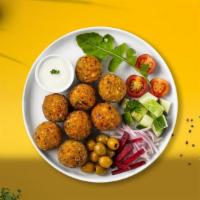 Bouncing Falafel Balls · Baked and fried mixture of garbanzo beans, fava beans, coriander, cumin, parsley and onions....
