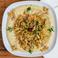 Hummus with Chicken · A mixture of mashed garbanzo beans, lemon juice, and tahini, and garlic served with pita bre...