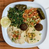 Vegetarian Combo · Hummus, baba ghanoush, med and tabbouleh salad, falafel and dolma.