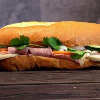 Deluxe Ham Sandwich (đặc biệt) · Our most popular sandwich!
Vietnamese ham, pork sausage, pate, in house mayo, headcheese, da...