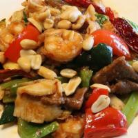 Kung Pao 3 Kinds · Spicy. Prawns, beef, chicken sauteed with zucchini, bell pepper, celery, water chestnut, pea...